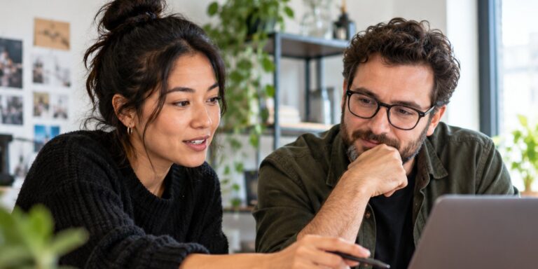 Team reviewing a campaign together on a laptop